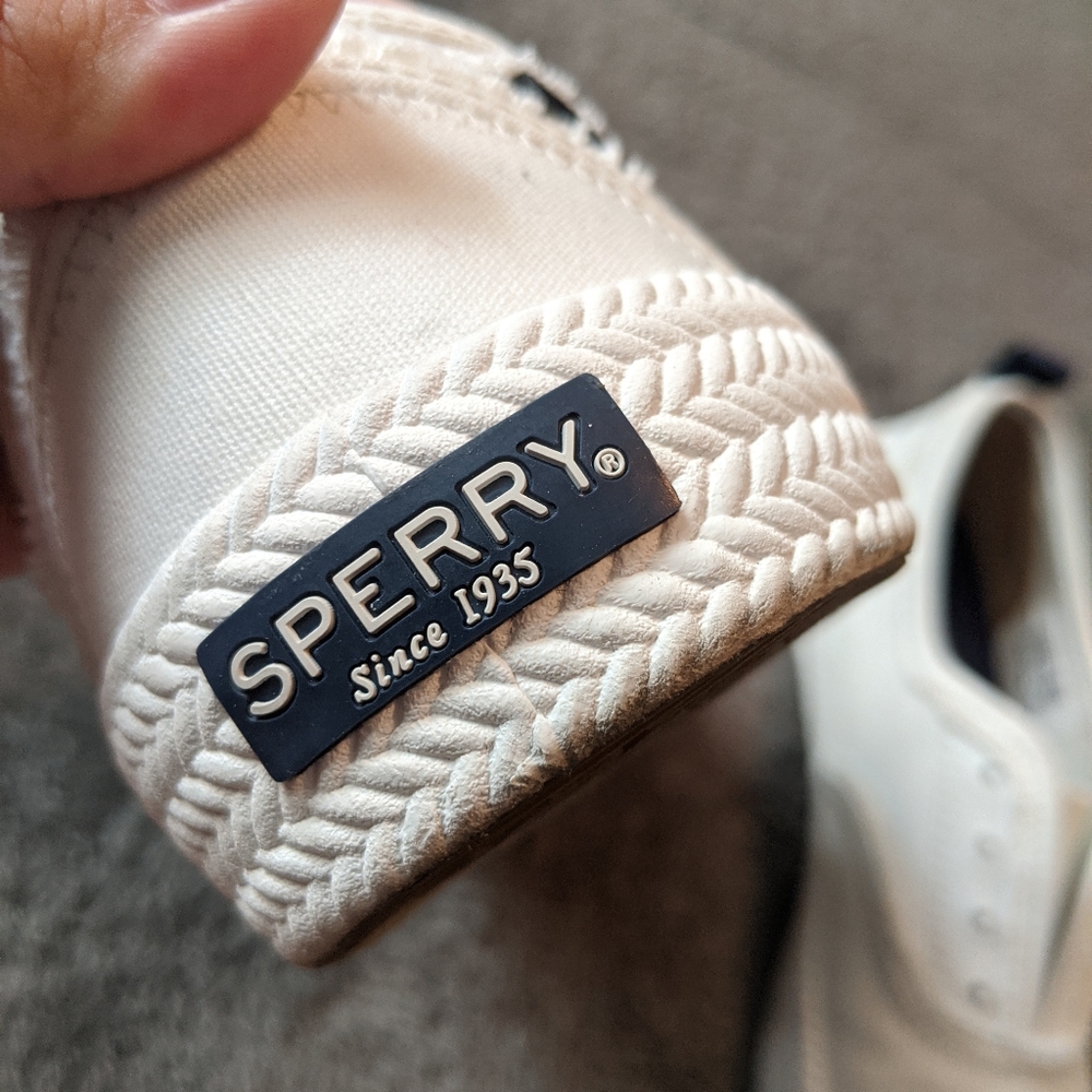 White Sperry slip ons